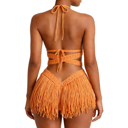 Curry Halle crochet one-piece with wrap ties and straight Full Skirt fringe around the back, rear three-quarter studio view