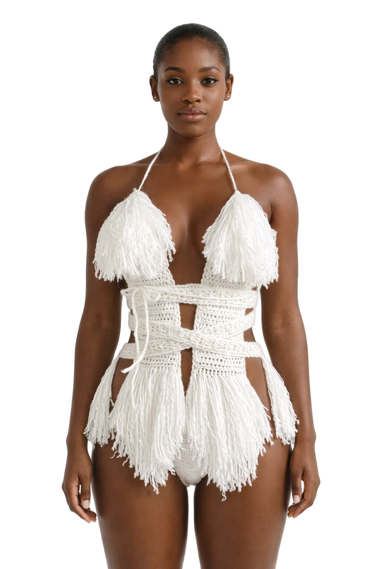 Model wearing the White Hebe crochet one piece, size S, by TaniJay Crochet.