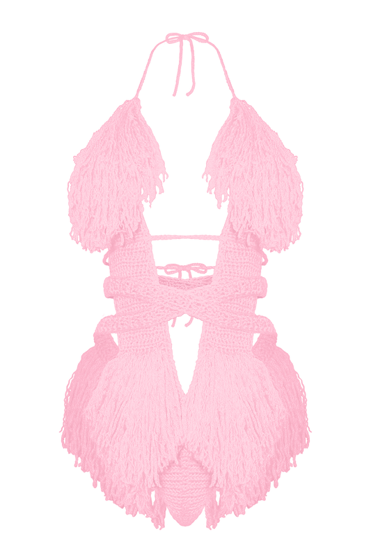 Model wearing the Baby Pink Hebe crochet one piece, size S, by TaniJay Crochet.