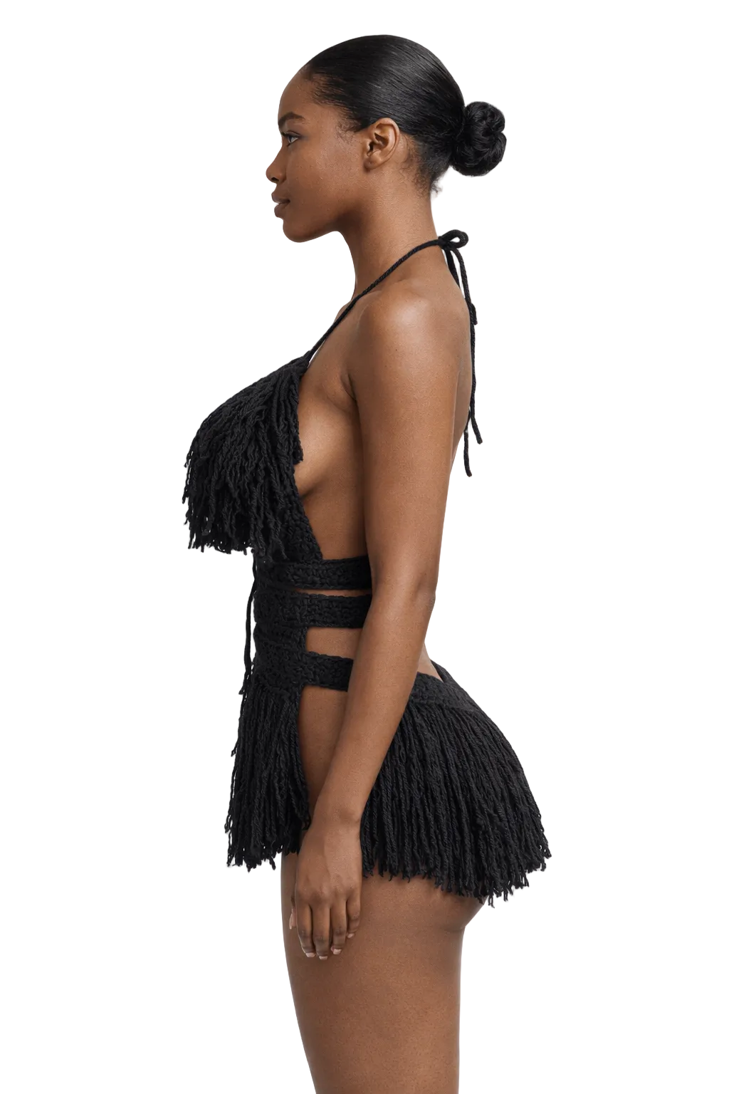 Model wearing the Black Hebe crochet one piece, size S, by TaniJay Crochet.