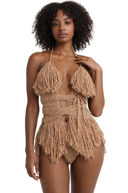 Model wearing the Cafe Latte Hebe crochet one piece, size M, by TaniJay Crochet.