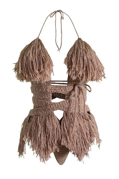 Model wearing the Cafe Latte Hebe crochet one piece, size M, by TaniJay Crochet.