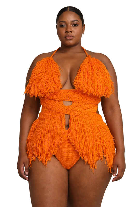 Model wearing the Pumpkin Hebe crochet one piece, size XL, by TaniJay Crochet.
