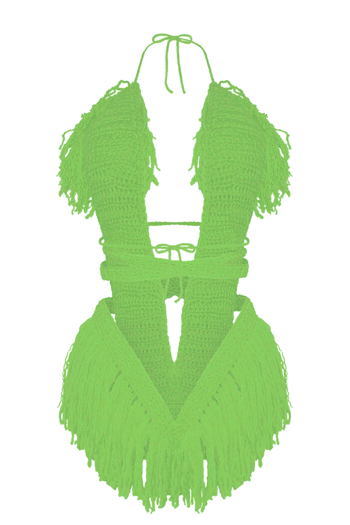 Model wearing the Spring Green Hebe crochet one piece, size S, by TaniJay Crochet.