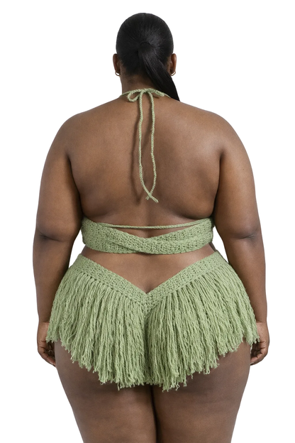 Model wearing the Tea Leaf Hebe crochet one piece, size 3XL, by TaniJay Crochet.