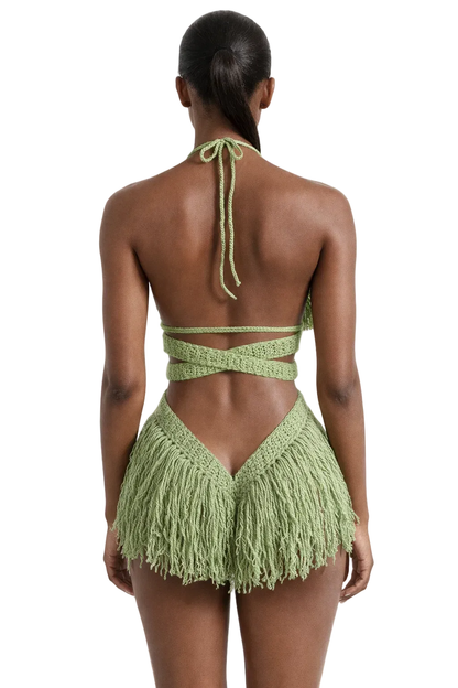 Model wearing the Tea Leaf Hebe crochet one piece, size S, by TaniJay Crochet.